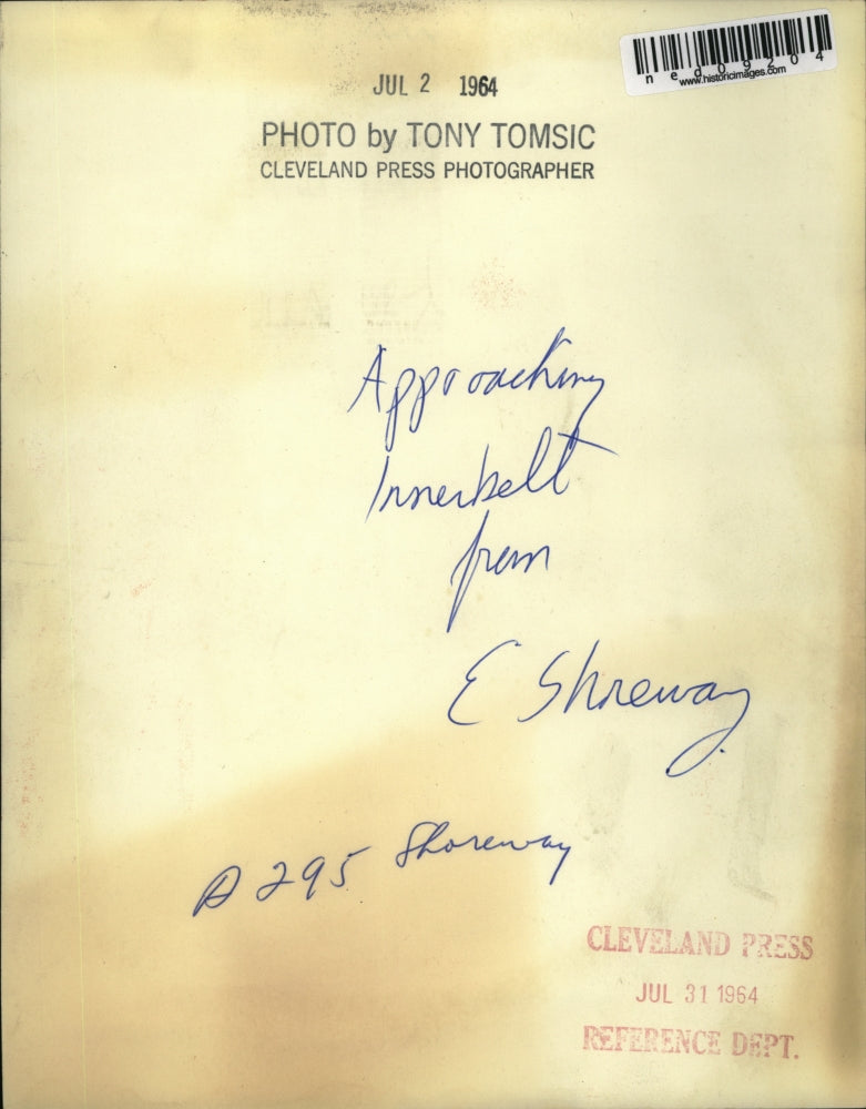 1964 Press Photo Car approaching Innerbelt bridge from E Shoreway in Ohio