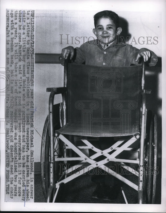 1955 Press Photo Patrick Michael Smallwood gives wheelchair to boy named Hubie