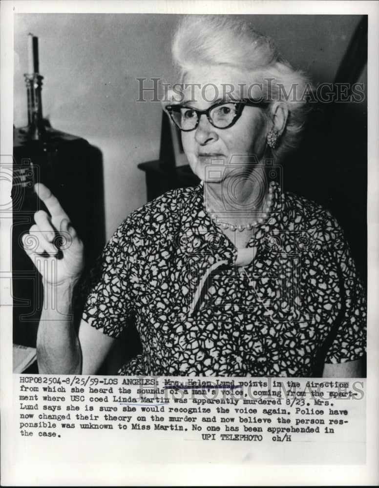 1959 Press Photo La Calif Mrs Helen Lund points to murder scene of L Martin
