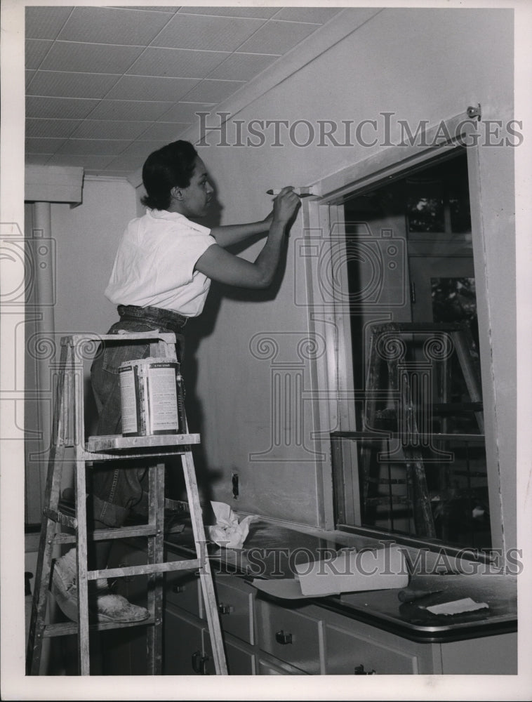 1957 Media Photo Woman Painting Around Window