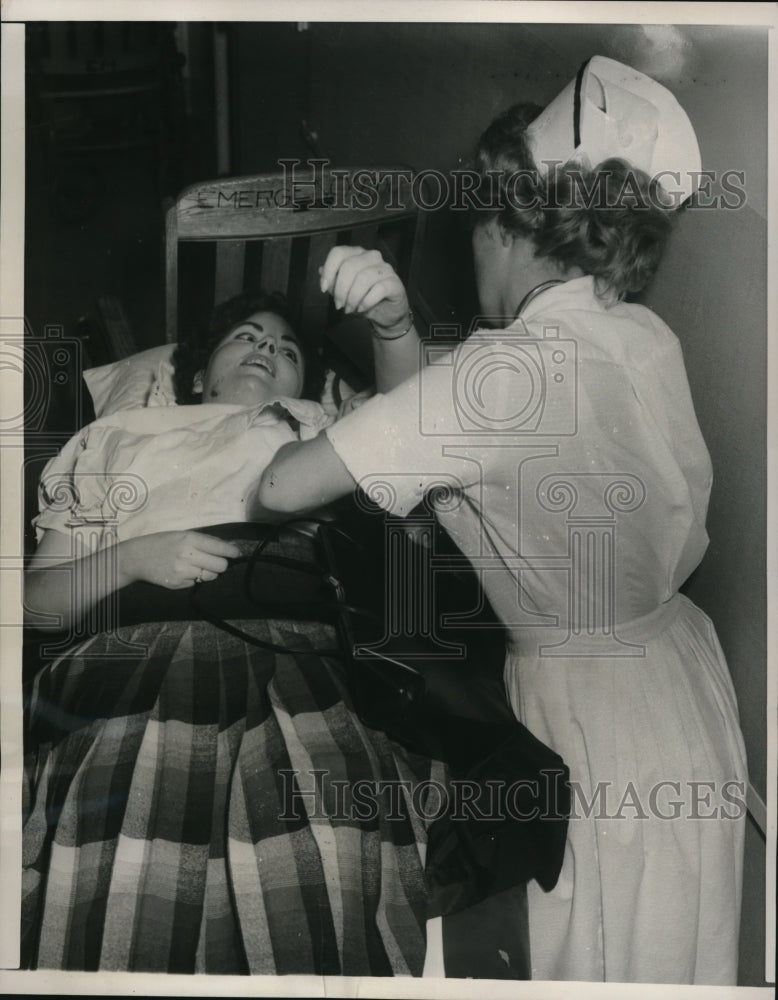 Load image into Gallery viewer, 1960 Press Photo Blood pressure examination for Betty Gillespie after accident
