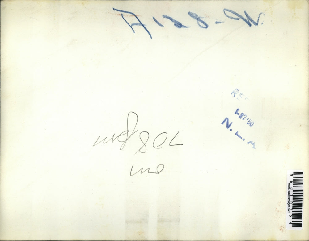 1950 Press Photo Ambulance Stewards Work To Extricate George McGraw