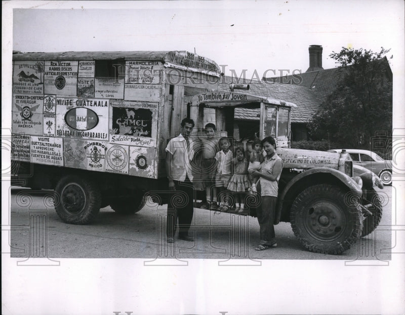 Load image into Gallery viewer, 1956 Media Photo Carlos Londano with wife and 4 children and 36 year old truck
