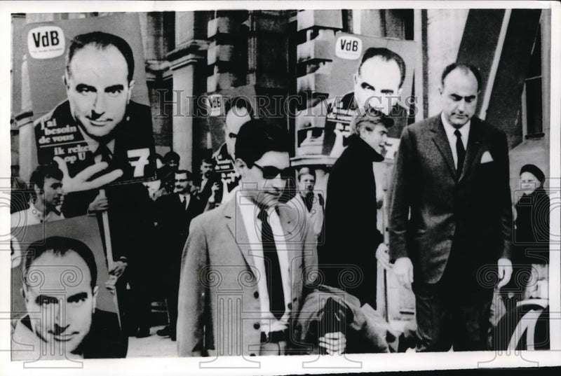 Load image into Gallery viewer, 1968 Press Photo Ex-Belgian Premier Paul Vanden Boeynants leaves polling bureau
