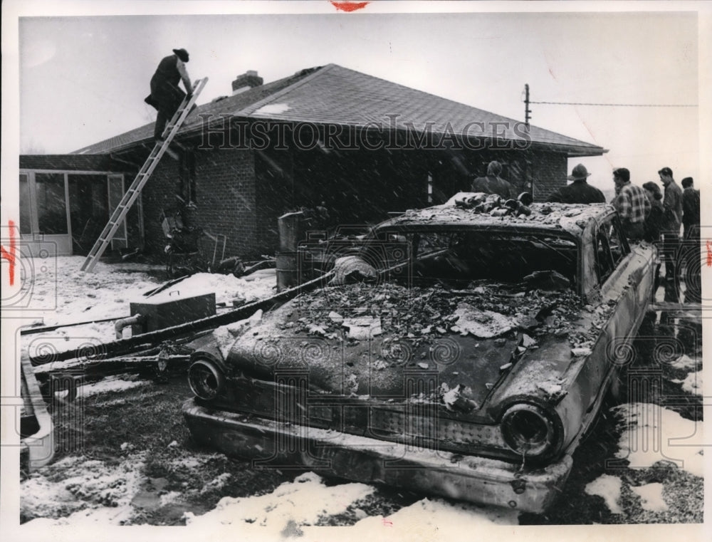 1961 Press Photo A huge fire destroyed the home and auto of Geo Durisek