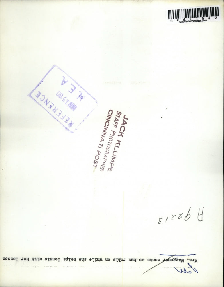 1960 Media Photo Mrs. Waggoner cooks as bus rolls with her daughter Connie