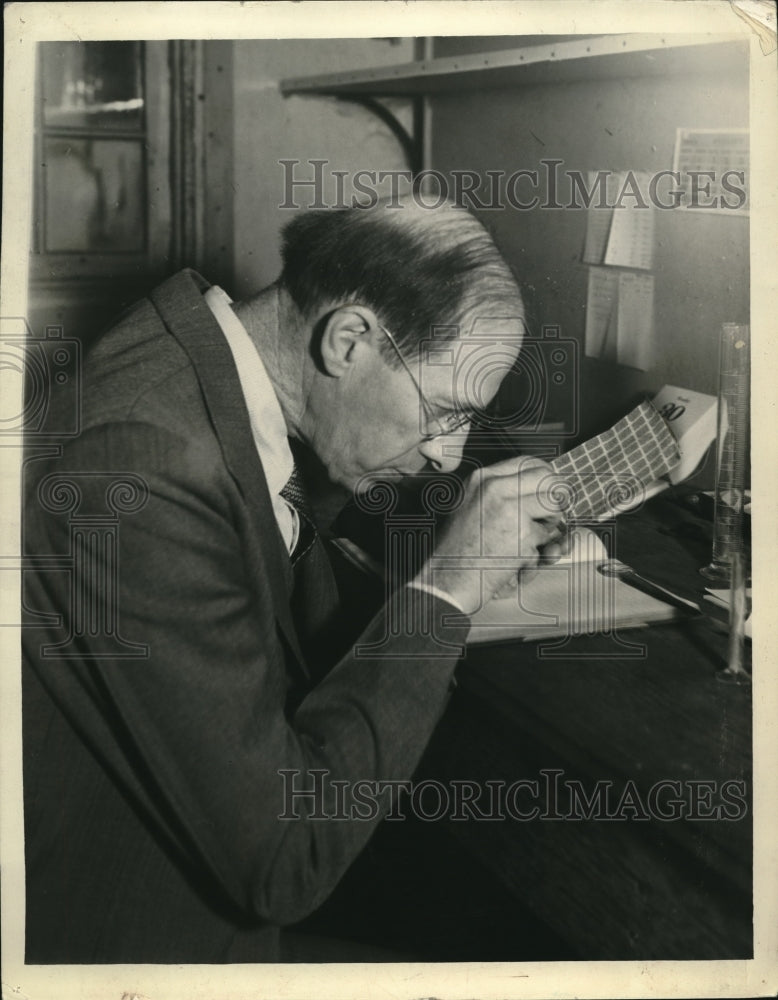 Load image into Gallery viewer, 1937 Media Photo Dr. Austine Morrill inspecting sheets of trichogramma wasp eggs

