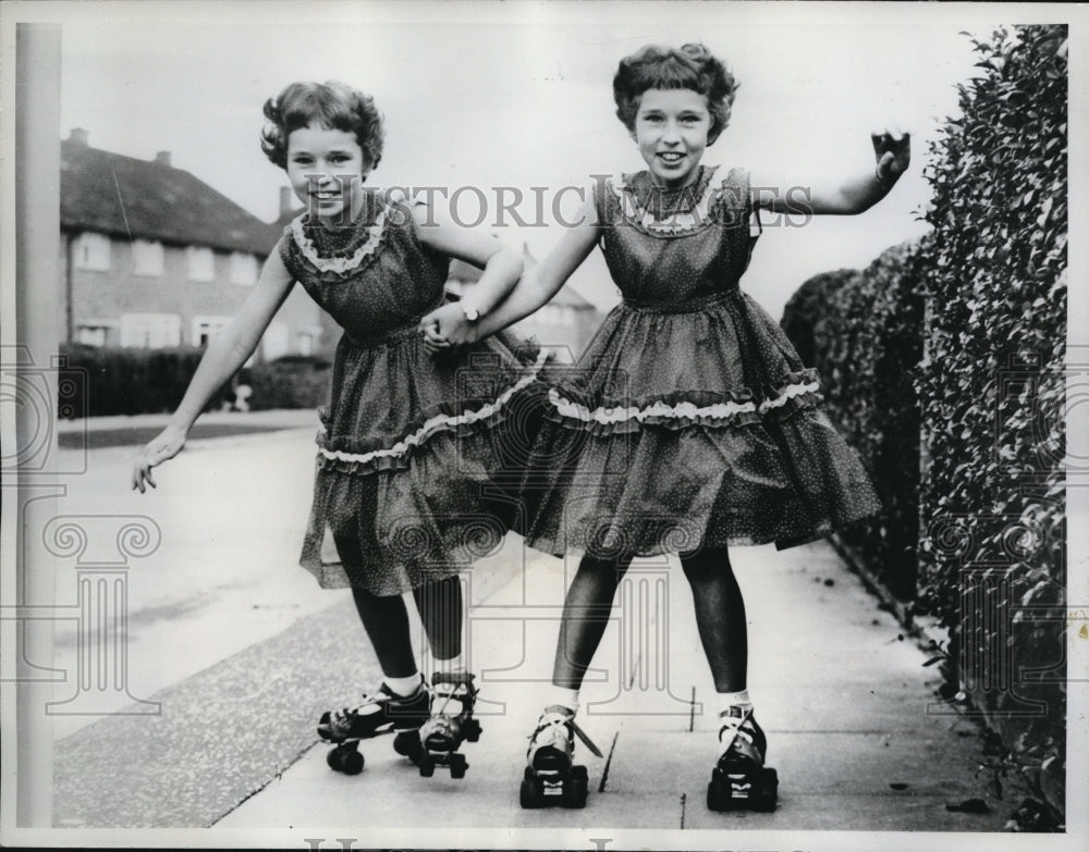 1961 Media Photo Kathleen and Rosemary Anblow Rollerskating