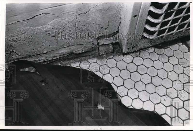 Load image into Gallery viewer, 1966 Media Photo Worn Clothing w Holes on Tiled Apartment Floor, Wall w Cracks
