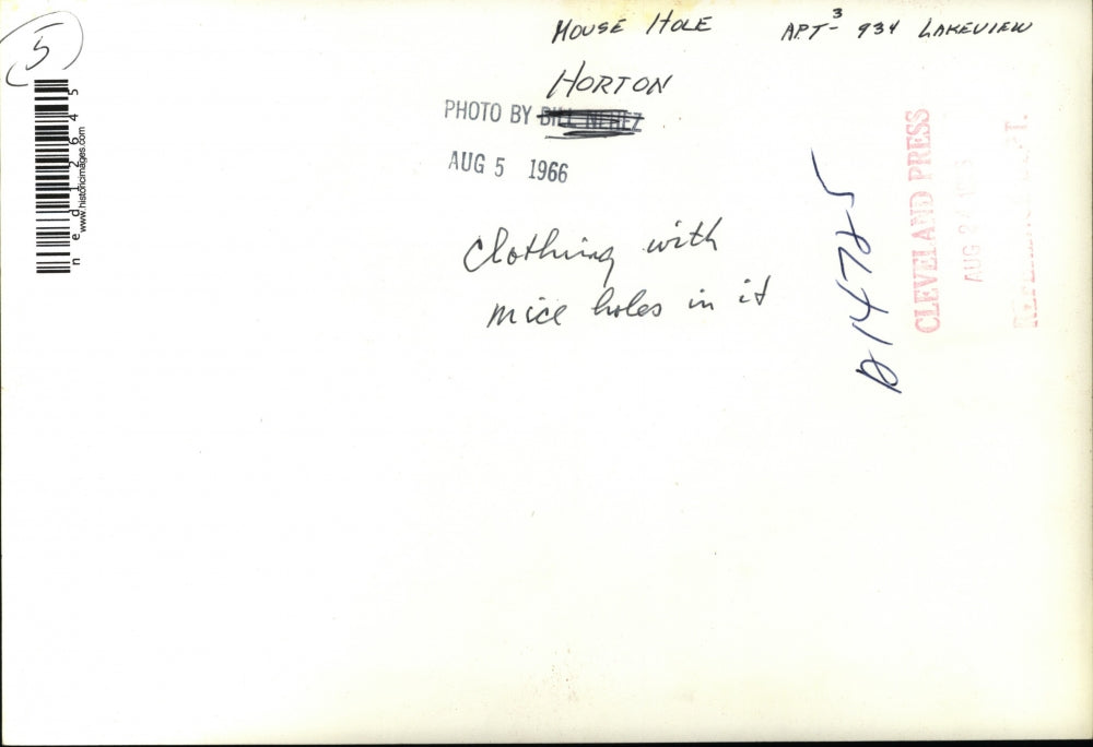 1966 Media Photo Worn Clothing w Holes on Tiled Apartment Floor, Wall w Cracks