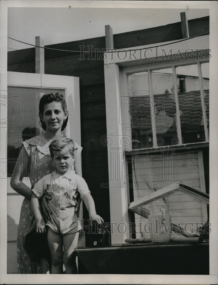 Load image into Gallery viewer, 1947 Media Photo Mrs. Luisa Thompson with his little boy Tommy after the tornado
