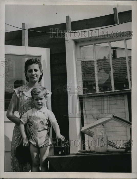 1947 Media Photo Mrs. Luisa Thompson with his little boy Tommy after the tornado