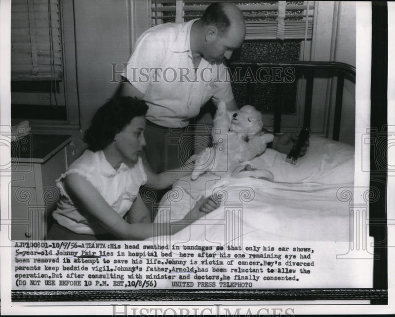 Load image into Gallery viewer, 1956 Press Photo Johnny Pair eye cancer victim at the hospital with hi Parents.
