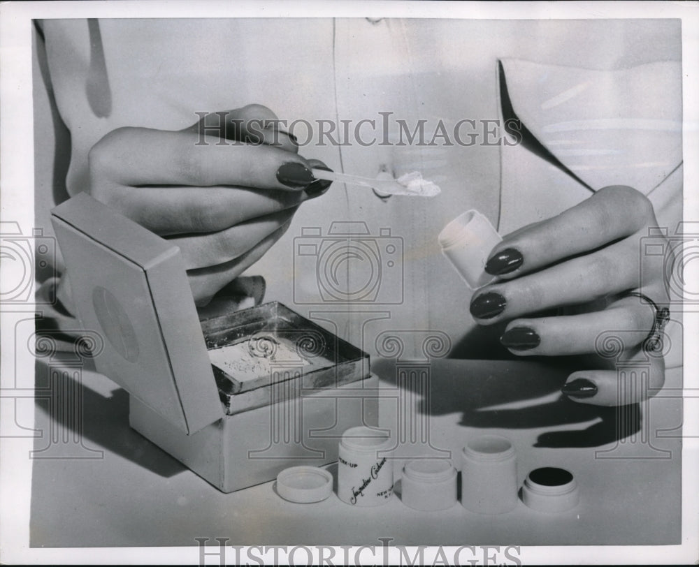 1950 Media Photo Cylinder to hold cosmetics with screw together compartments