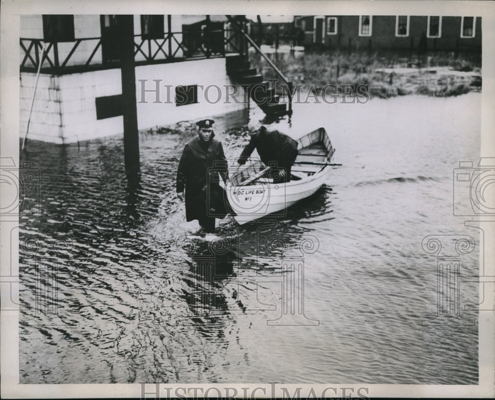1938 Media Photo Revere Mass Police Officer DeNapoli pulls out lifeboat to