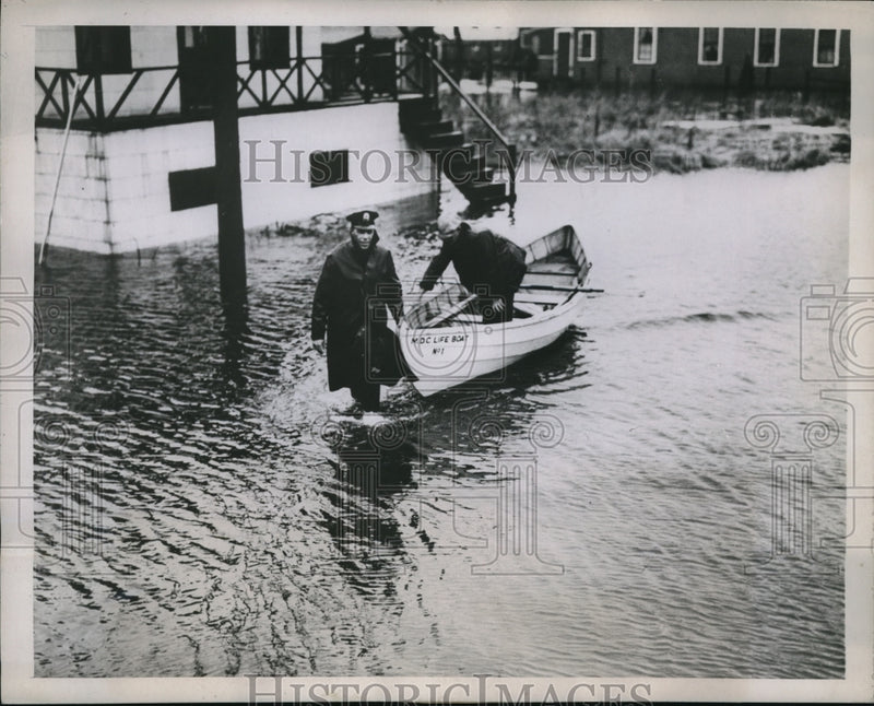 Load image into Gallery viewer, 1938 Media Photo Revere Mass Police Officer DeNapoli pulls out lifeboat to
