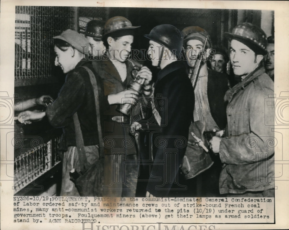 1948 Media Photo Foulquemont miners get lamps as armed soldiers stand nearby