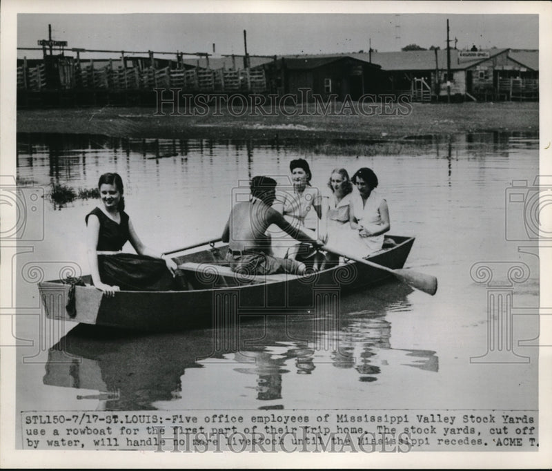 Load image into Gallery viewer, 1951 Press Photo Employees of Mississippi Valley Stock Yards use a rowboat
