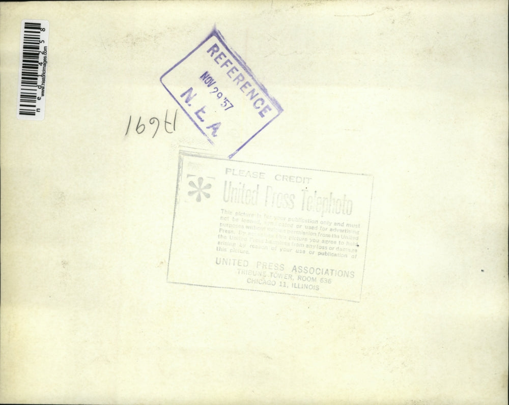 1957 Press Photo Smoke rolling from the rear of a building housing groceries