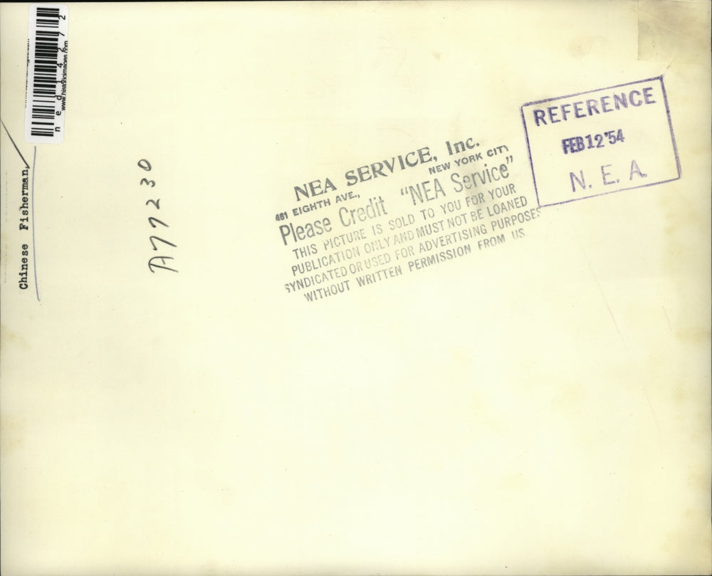 1954 Media Photo Chinese fisherman on hos boat at shoreline