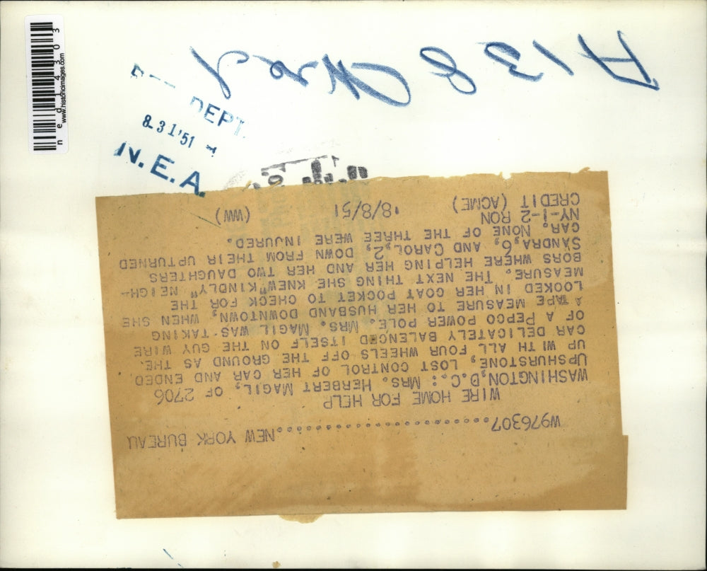 1951 Media PhotoWashington, DC Car balanced on guy wire.