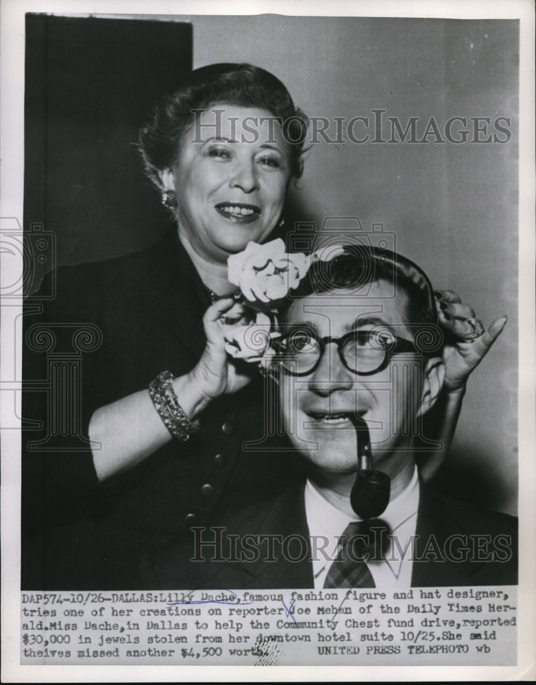 1954 Media Photo Dallas Lilly Dache designer tries one creation on reporter Joe