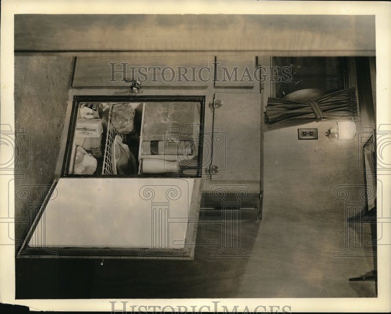 Load image into Gallery viewer, 1936 Media Photo Interior of a mobile trailer home on display built in storage
