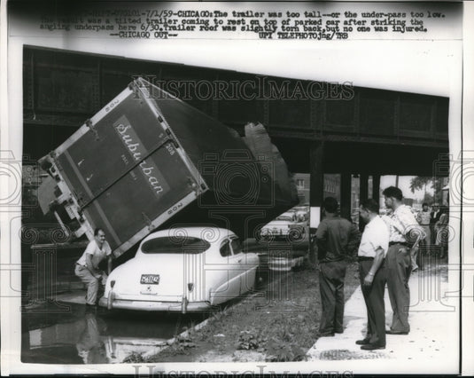 1959 Media Photo Chicago, Semi truck tips over on auto parked at side of road