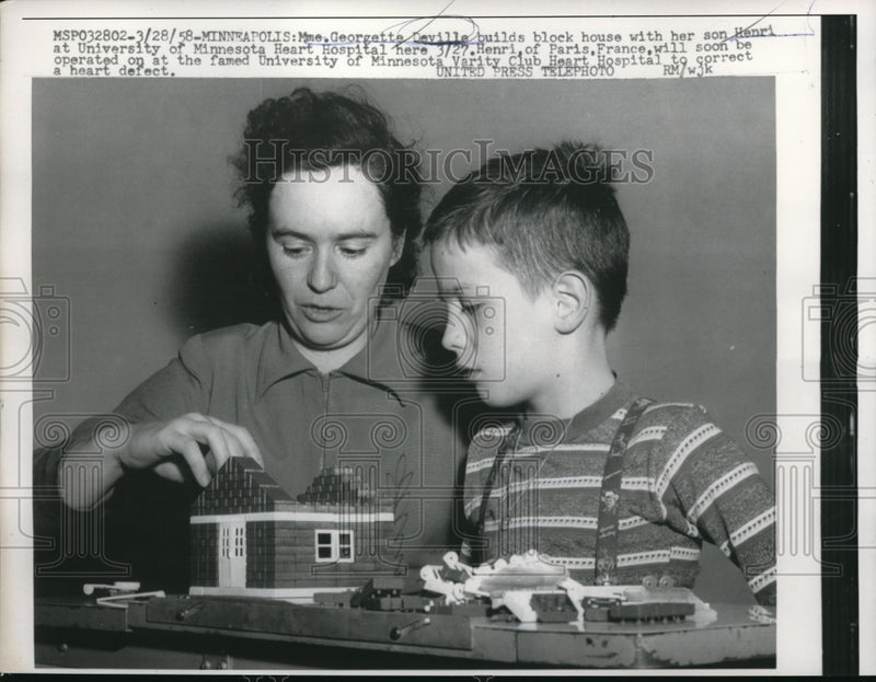 Load image into Gallery viewer, 1958 Press Photo Georgetta Deville Builds Blocks With Her Son At The Hospital
