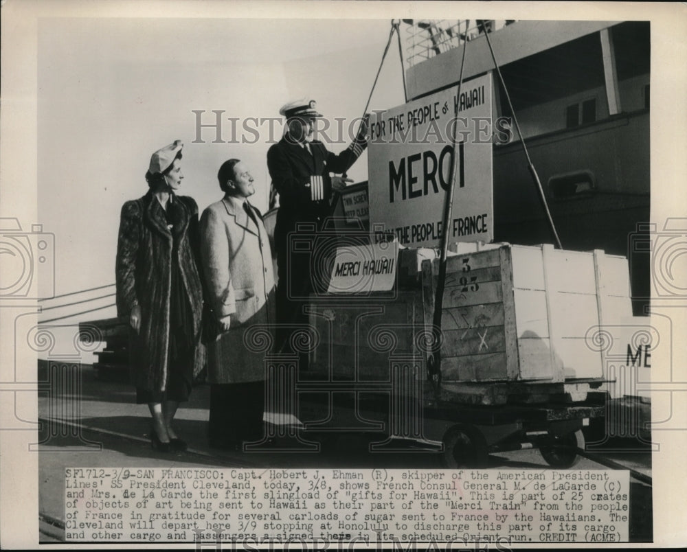 1949 Media Photo Hobert J Ehman showing M. de LaGarde and Mrs de LaGarde gifts