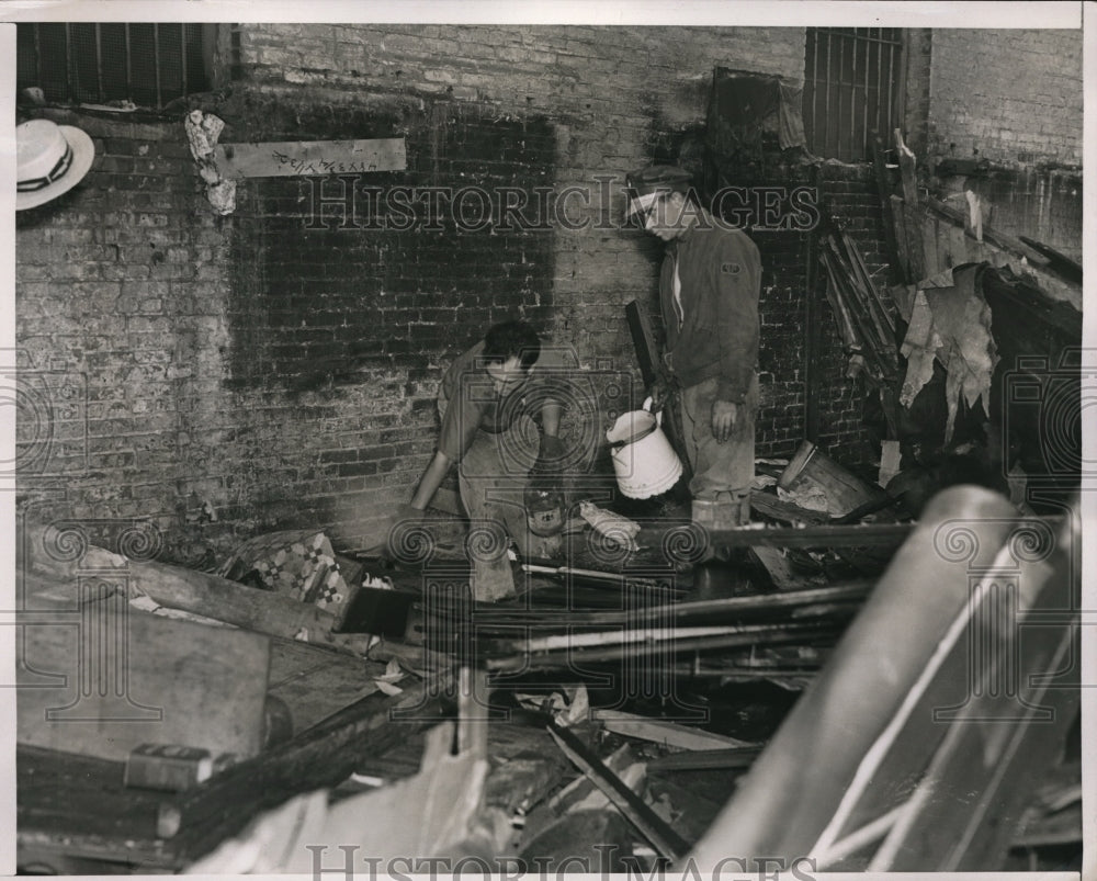 1938 Media Photo Sanitation Dept employees at a disaster camp site - ned15882