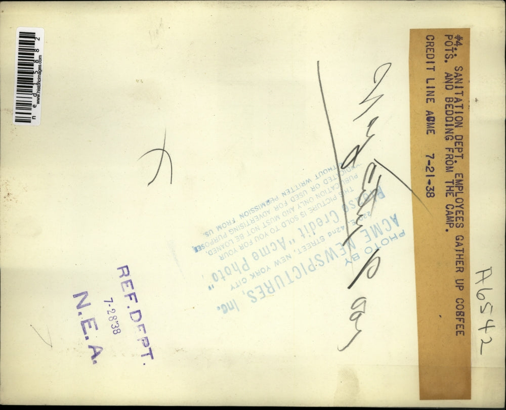 1938 Media Photo Sanitation Dept employees at a disaster camp site - ned15882