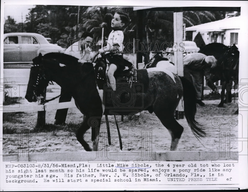 Load image into Gallery viewer, 1956 Press Photo Miami, Fla, Mike Sibole age4 cancer child rides a horse
