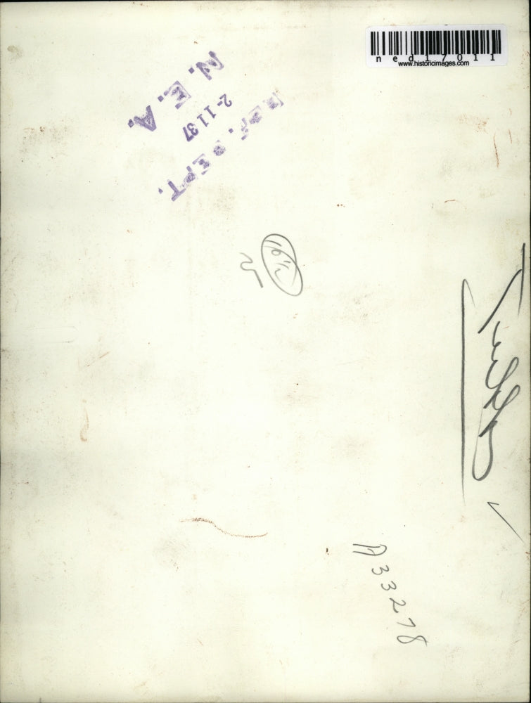 1937 Press Photo Mr Tubbs in a suit sitting on a railing