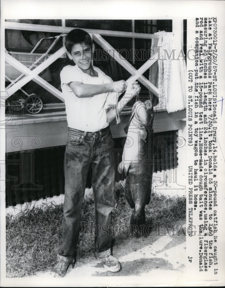 1957 Press Photo St Louis Mo Donald Drury & 30 pound catfish he caught