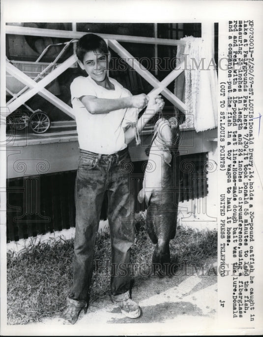 1957 Press Photo St Louis Mo Donald Drury & 30 pound catfish he caught