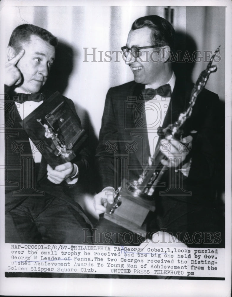 Load image into Gallery viewer, 1957 Press Photo George Looks Puzzled After Receiving His Small Award
