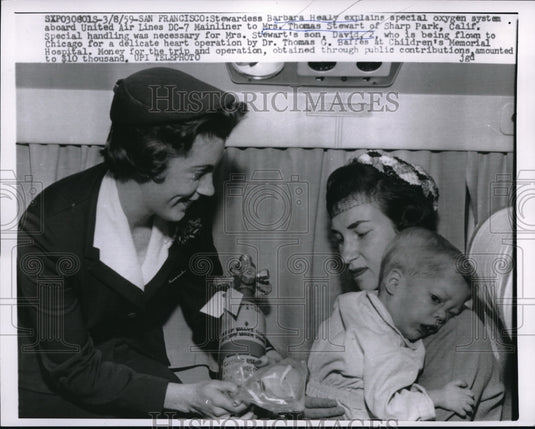 1959 Press Photo San Francisco Stewardess Barbara Healy explains oxygen system