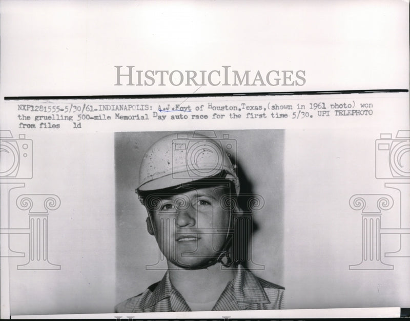 Load image into Gallery viewer, 1961 Press Photo A.J. Foyt of Houston Texas, won the gruelling 500-mile
