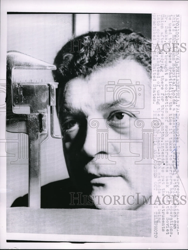 Load image into Gallery viewer, 1963 Press Photo Dr. Charles L. Sacks with Russian-made Surgical Equipment
