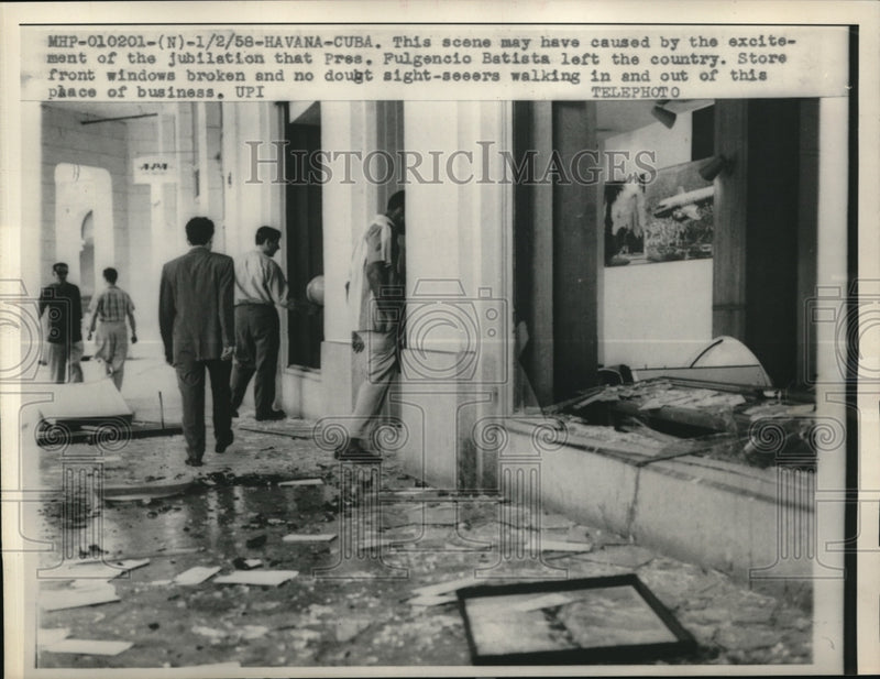 Load image into Gallery viewer, 1958 Press Photo Damage after jubilation of President Batista leaving country
