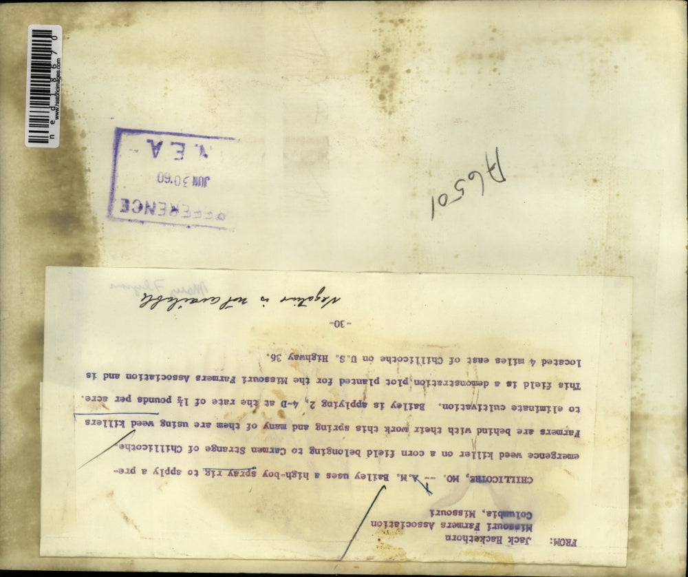 1960 Press Photo Chillicothe Mo AM Bailey on tractor spayer in corn field