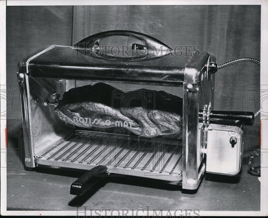 1953 Press Photo A Rotiss o mat oven demoed in a kitchen