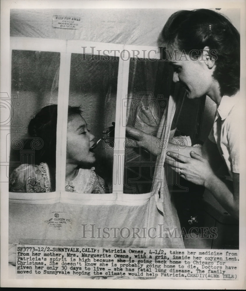 1949 Press Photo Patricia Owens taking Medicine from Mother Marguerite Owens