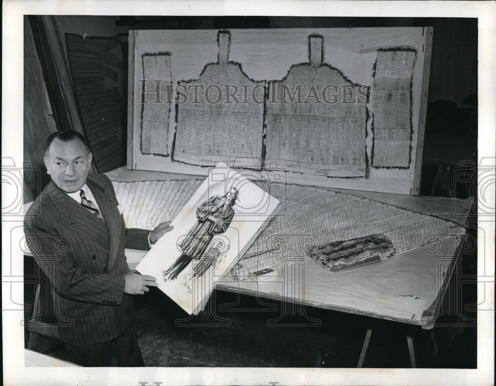1944 Press Photo I.J Fox holding designer's sketch of the coat