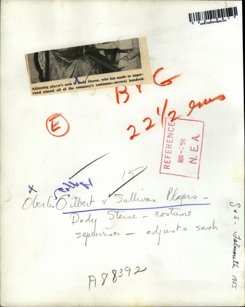 1956 Press Photo Dody Sterne Adjusts Gilbert & Sullivan Players Sash