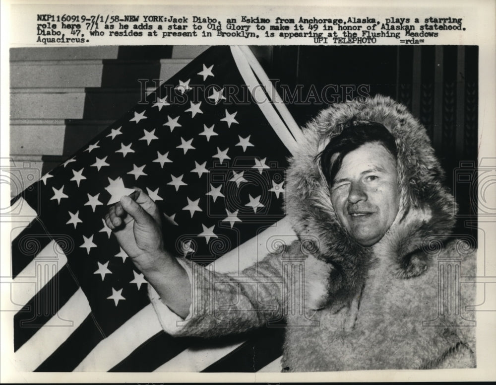 1958 Press Photo Eskimo Jack Diabo adding 49th star to Old Glory in New York