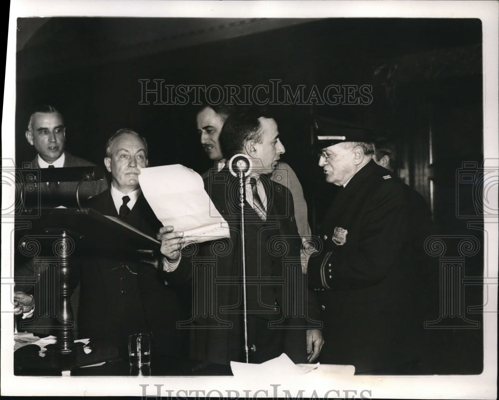 1938 Press Photo A. S. Shafer being pulled from the microphone after his time.