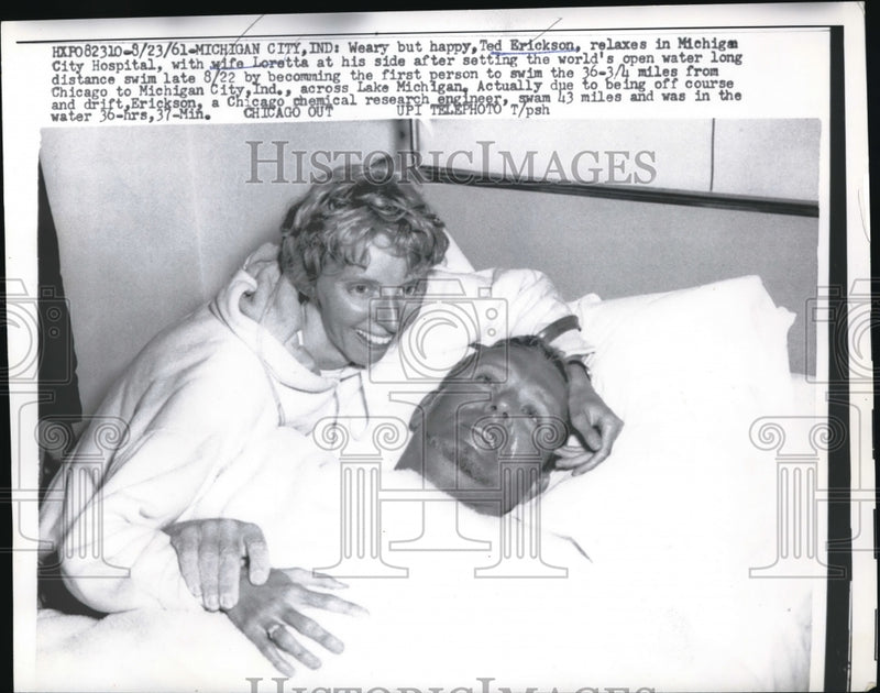Load image into Gallery viewer, 1961 Press Photo Ted Ericksons and his wife relaxing after swimming 36-3/4 miles
