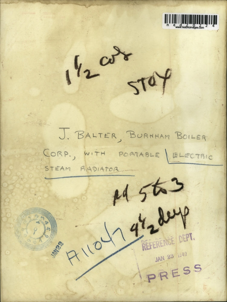 1940 Press Photo J. Balter With Portable Electric Steam Radiator - ned20224